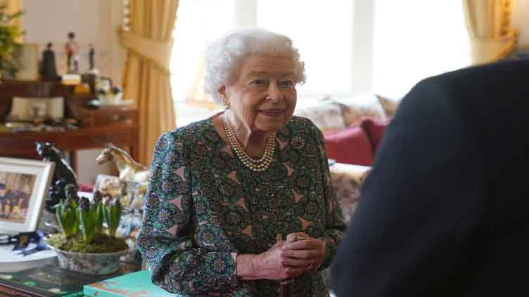 Queen still has mild COVID symptoms, cancels online meetings