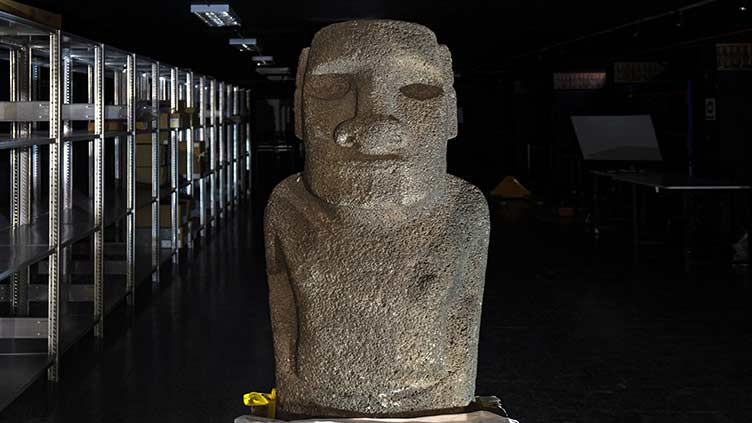 Easter Island 'Moai' stone statue begins long journey home