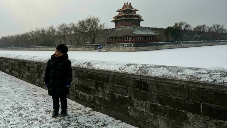 Snow falls on Chinese capital as two-week Olympics countdown starts