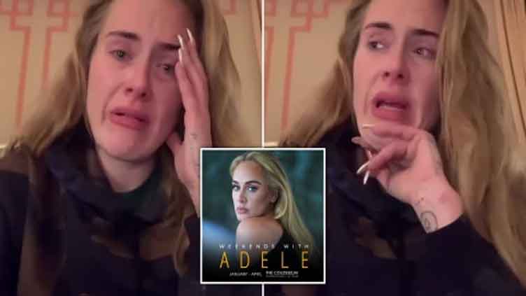 Tearful Adele apologises to fans for being forced to postpone entire Las Vegas residency