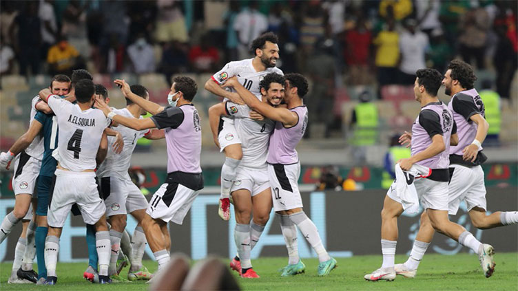 Salah takes Egypt through on penalties as two Cup of Nations matches moved