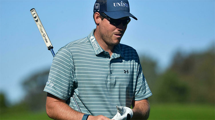 Schenk birdies eight in a row, shares lead with Rahm, Thomas