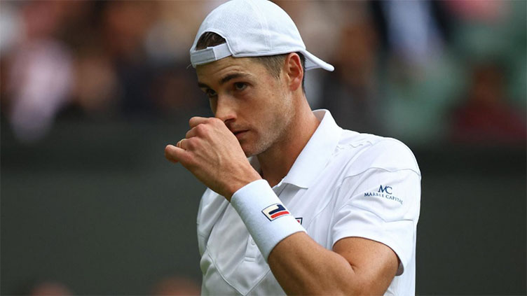 Isner out of Wimbledon despite new aces record