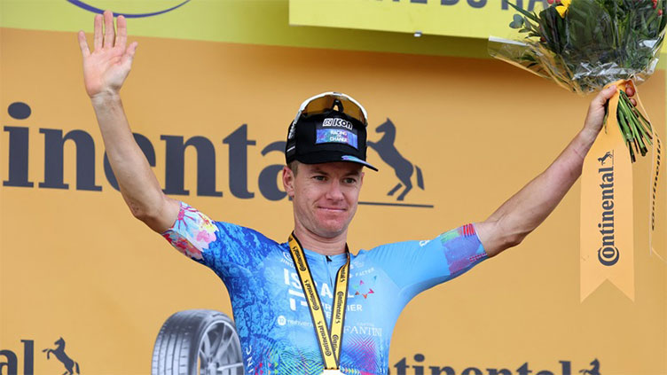 Cobble king Clarke wins Tour de France stage five with bike throw