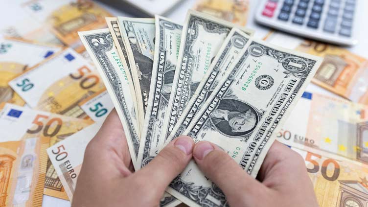 Euro on the brink of breaching parity, stocks slide again