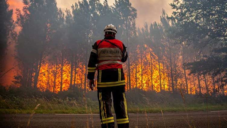 'Climate change affects everyone': Europe battles wildfires in intense heat
