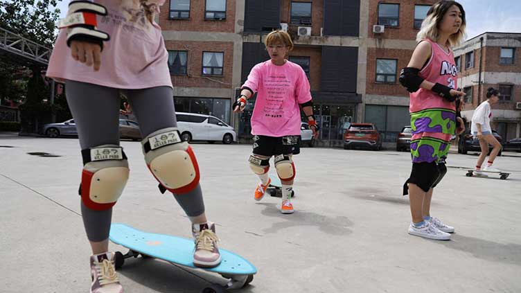 Amid COVID shutdowns, Chinese women flock to skateboarding