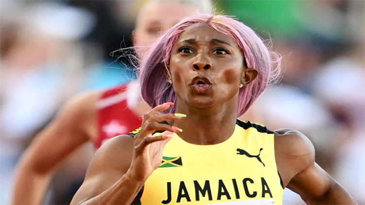 Fraser-Pryce coasts into world 200m final