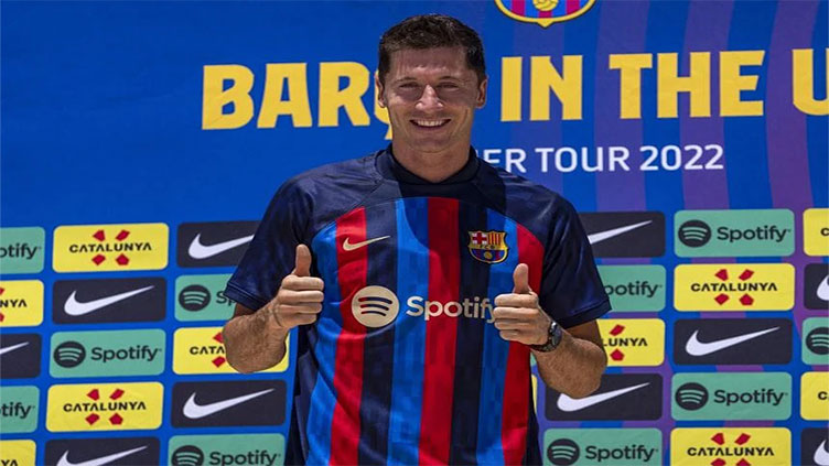 Lewandowski says 'hungry' for success at Barca unveiling