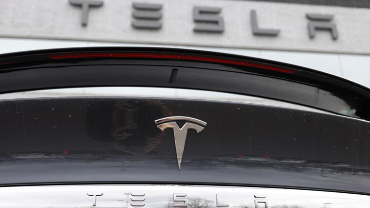 Tesla profits top estimates despite China production hit