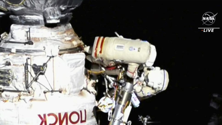 Italian, Russian share rare spacewalk amid Ukraine tensions