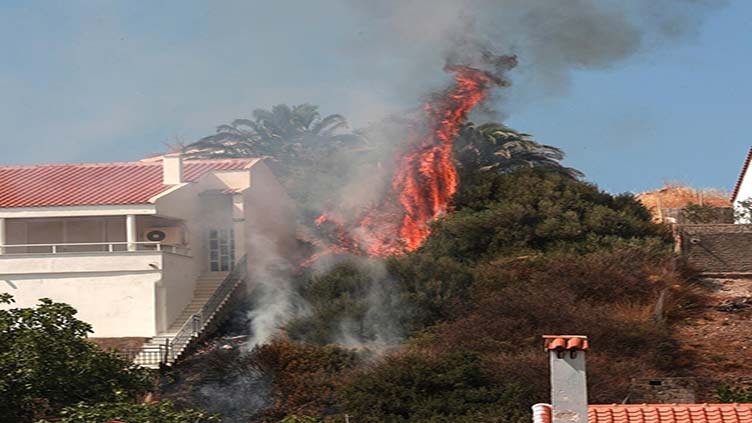 Greece battles fierce wildfires amid heatwave