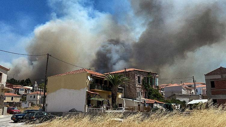Greece, California battle fierce wildfires amid heatwaves