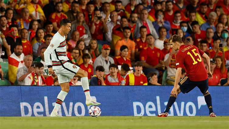 Spain pegged back by late Portugal equaliser