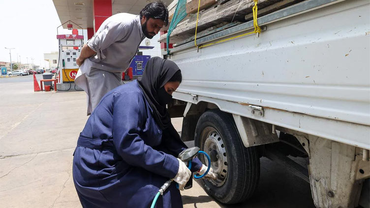 Saudi Arabia's women move from behind the wheel to under the hood