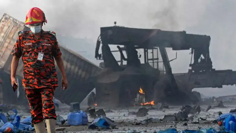 Bangladesh port depot fire kills 49, injures 300