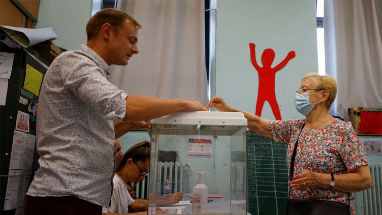 French head to polls as Macron battles for majority in parliament