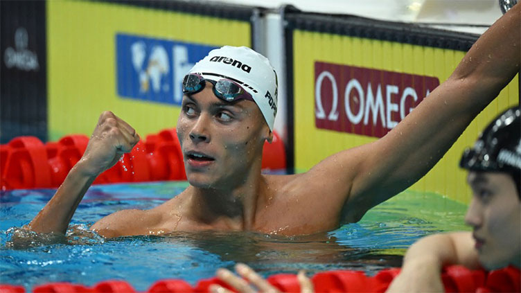 Romanian Popovici, 17, wins men's 200m freestyle world title