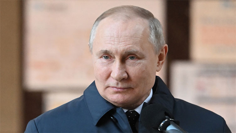 Putin lays out conditions as Russians shell Ukrainian city