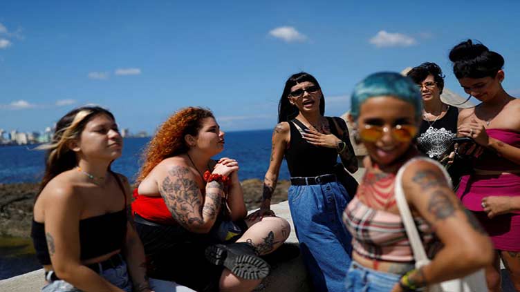 Cuban women emerge from shadows to promote body art once seen as taboo