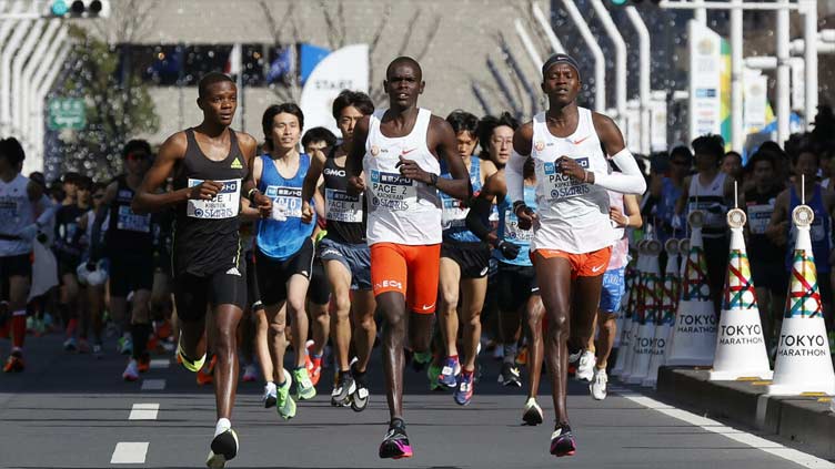 Kipchoge wins Tokyo marathon but misses out on new world record