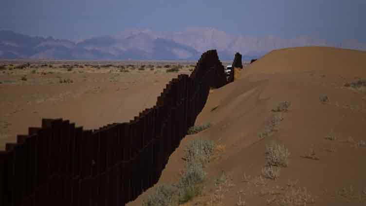 Mexico finds 11 bodies in clandestine pits near US border