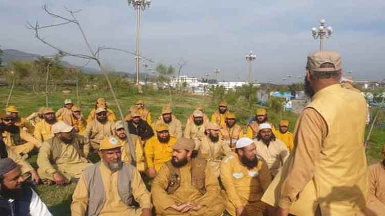 JUI's Ansar-ul-Islam set up camp inside Parliament Lodges