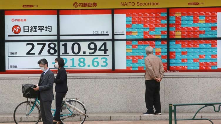 Most Asian markets down as traders track Ukraine invasion