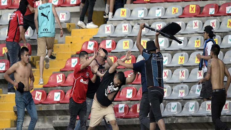 Mass brawls, attacks as football violence spreads in Latin America