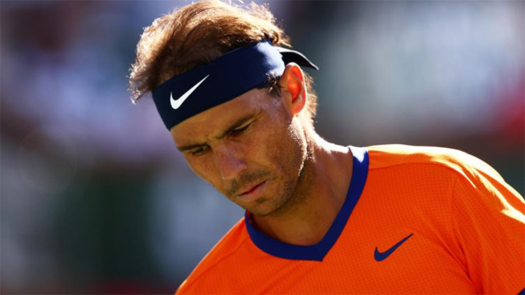 Nadal out for up to six weeks with rib injury