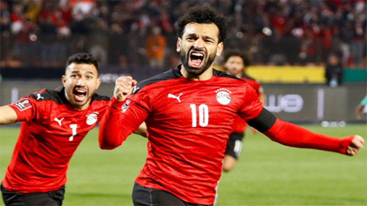 Salah sets up win for Egypt over Senegal, Slimani stuns Cameroon