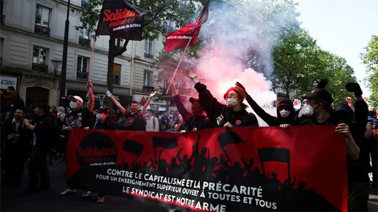 Violence erupts in May Day protests in Paris, marchers criticise re-elected Macron