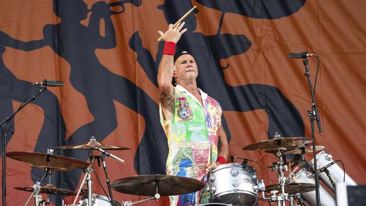 Chili Peppers honor Foo Fighter drummer at Jazz Fest