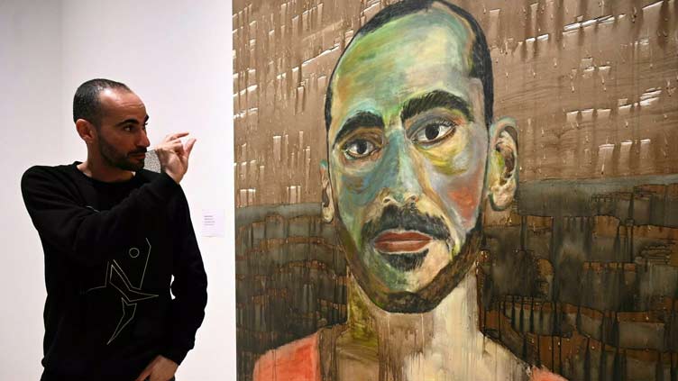 Refugee who paints with a toothbrush nominated for Australian art prize