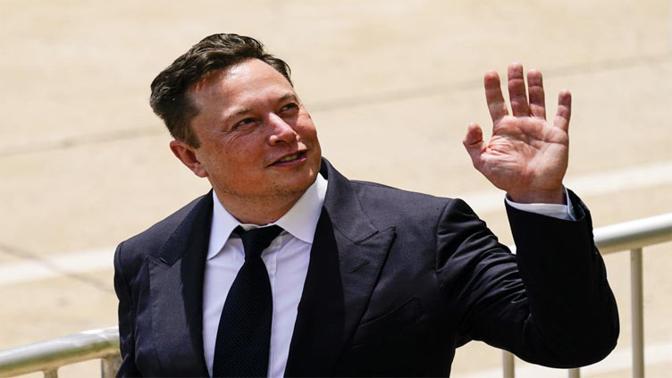 Elon Musk says Twitter deal 'temporarily on hold'