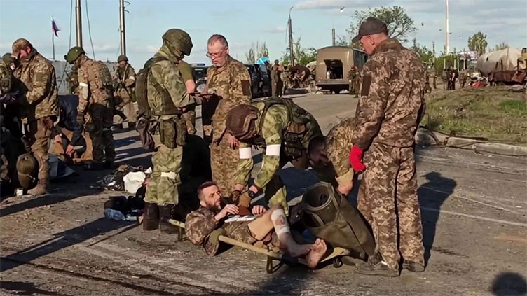 Russia says hundreds of Ukrainians surrender at Azovstal, Kyiv urges swap