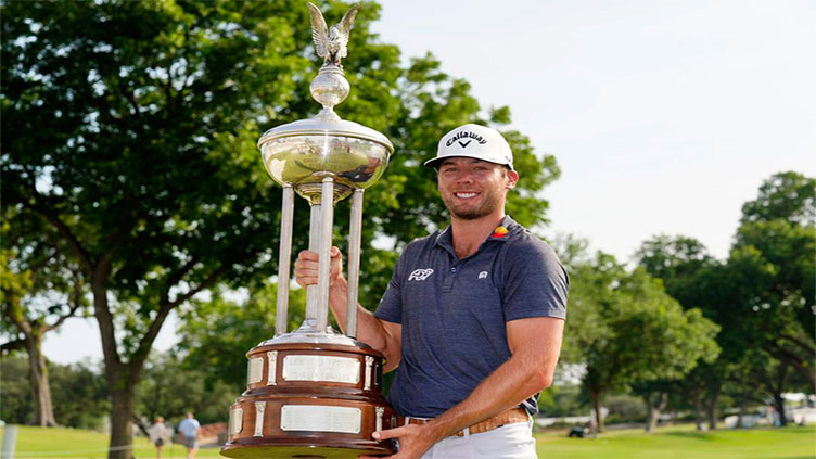 Burns beats Scheffler in playoff to win at Colonial