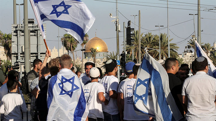 Israeli nationalists march through Jerusalem's Old City