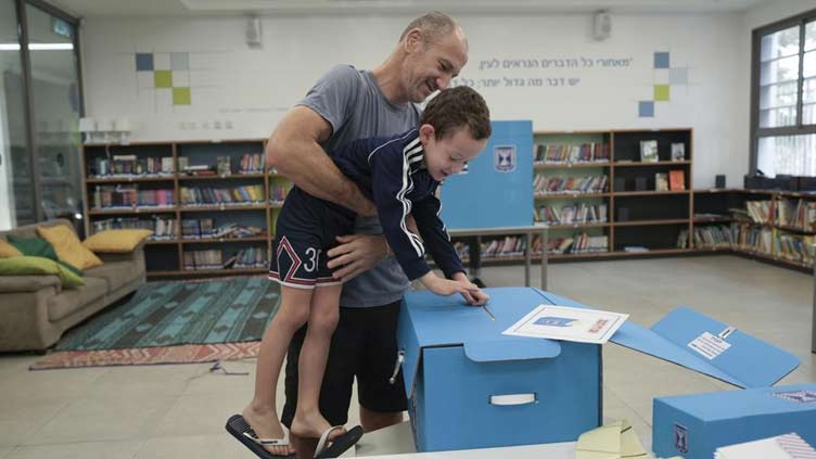 Israelis vote again, as political crisis grinds on