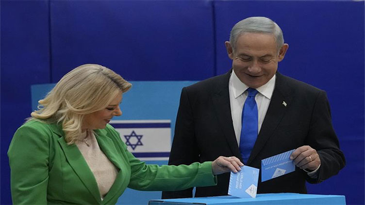 Israel voters flock to the polls as Netanyahu eyes comeback