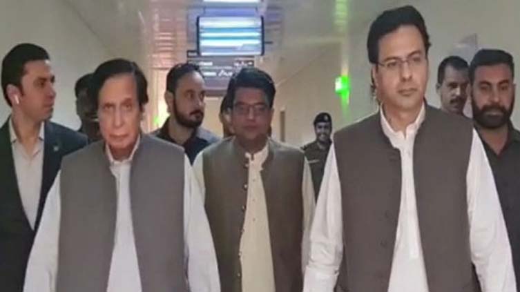 CM Punjab, Moonis visit Imran Khan to inquire his health