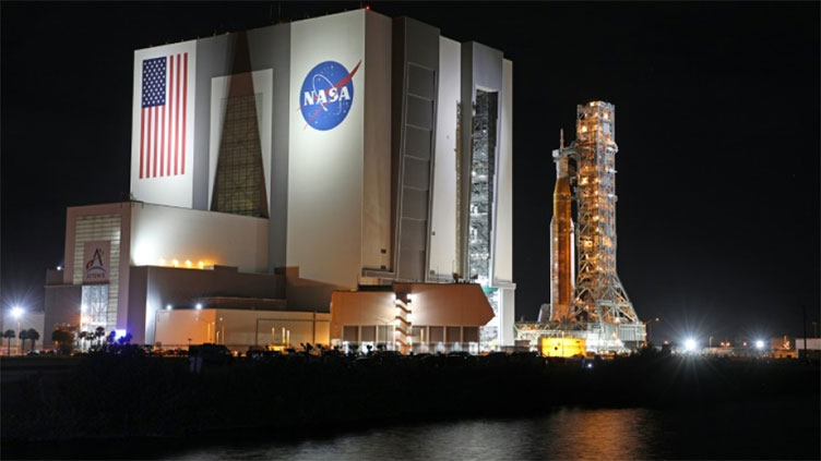 NASA rolls Moon rocket out to Kennedy Space Center launch pad