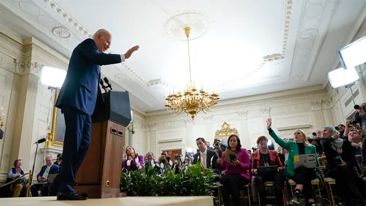 Biden hails 'good day for democracy' as Republican wave flounders