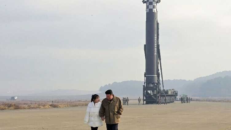  North Korea's Kim reveals daughter at ballistic missile test