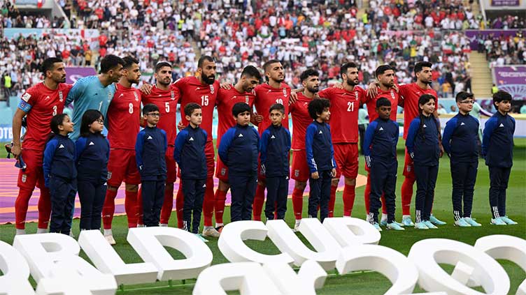 As protests rage in Iran, team fall silent for anthem at World Cup