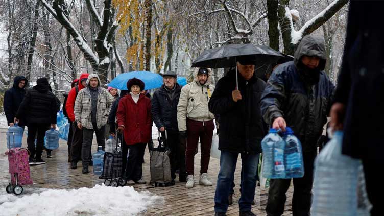  Snowy Kyiv grapples with power outages amid fears of new attacks