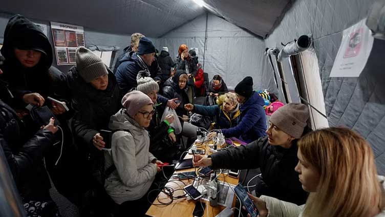  Air raid sirens blare in Ukraine as NATO meets to promise aid