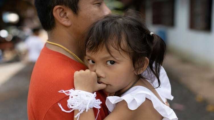  'Miracle' toddler survived Thailand nursery massacre asleep under blanket