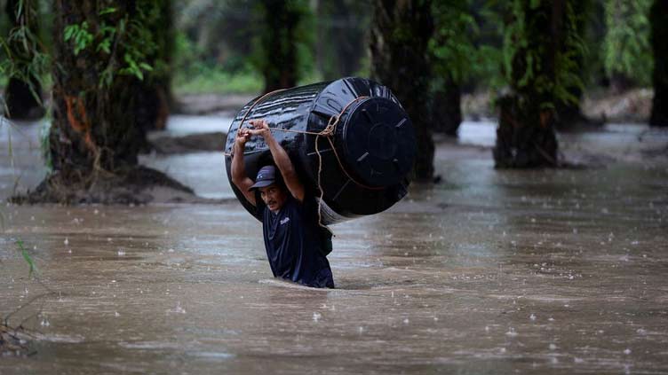 Julia kills 14 in Central America as it churns toward Mexico