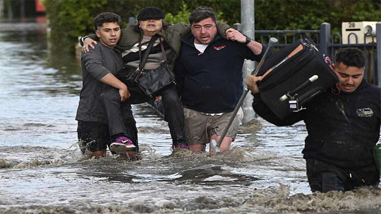 Flood waters swamp Melbourne as heavy rains slam three Australian states